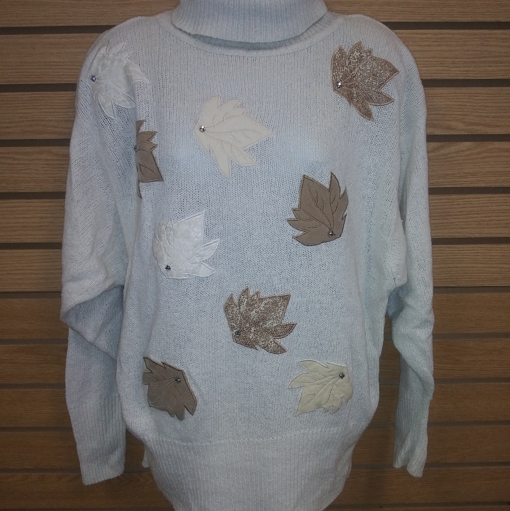 Vintage Michelle Stuart turtle neck sweater with appliqued fall leaves. Size L